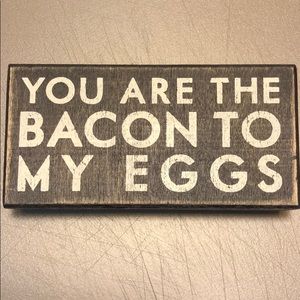 Black bacon and eggs decoration